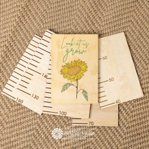 Timber growth chart with five panels and header with "Look at us Grow" text with a vibrant colourful sunflower design.