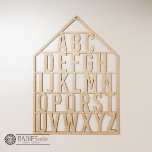 Timber alphabet wall art house design with A-Z letters for nursery decor. Styled in a nursery theme.