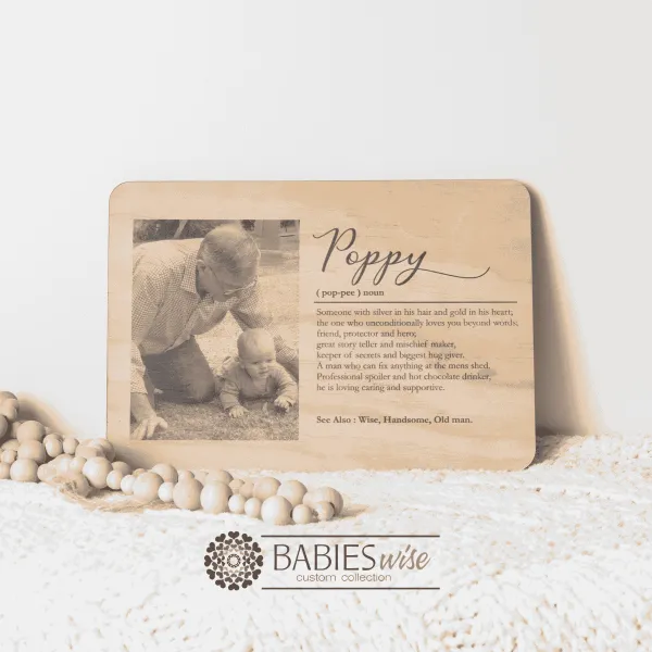 Personlised timber photo plaque featuring a cherished grandfather-and-grandchild customer supplied photograph along with a heartfelt definition of the word "Mother. Styled on a soft white blanket with wooden decorative beads.