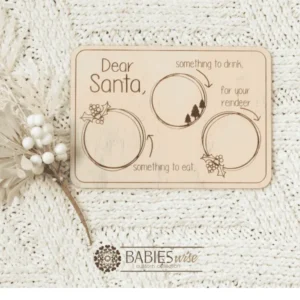 Retangle Timber Santa Snack tray available in UV printed colour or laser engraved finish. Features sections for Santa's drink, snack and reindeer treats. Styled on a soft white blanket with a white Christmas wreath.