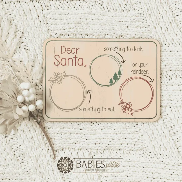Retangle Timber Santa Snack tray available in UV printed colour or laser engraved finish. Features sections for Santa's drink, snack and reindeer treats. Styled on a soft white blanket with a white Christmas wreath.